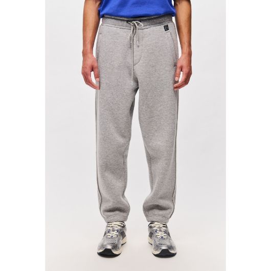 Снимка на DIRTY LAUNDRY MEN'S LOOSE SWEATPANTS WITH RAW EDGE DETAIL