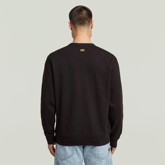 Показвай детайлите за G-STAR МЪЖКИ СУИТШЪРТ TEXT GRAPHIC В ЧЕРНО 3 - FanPoint Снимка на G-STAR МЪЖКИ СУИТШЪРТ TEXT GRAPHIC В ЧЕРНО 3