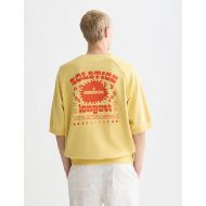 Picture of SCOTCH&SODA MEN'S FRONT AND BACK ARTWORK LOOSE FIT SHORT SLEEVE SWEATSHIRT IN BRIGHT YELLOW 5